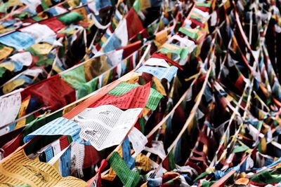 Close-up of prayer flags hanging outdoors