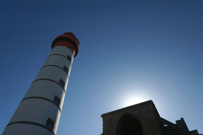 Low angle view of building against blue sky