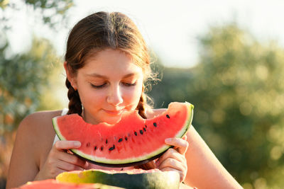 Portrait of woman eating ice cream