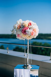 Close-up of flower vase on table