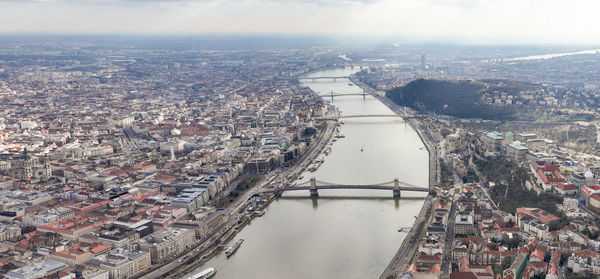 Budapest old town, danube river and elisabeth bridge, petofi bridge in background