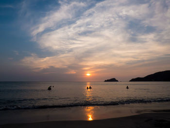 Scenic view of sea at sunset