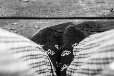 Low section of man with umbrella