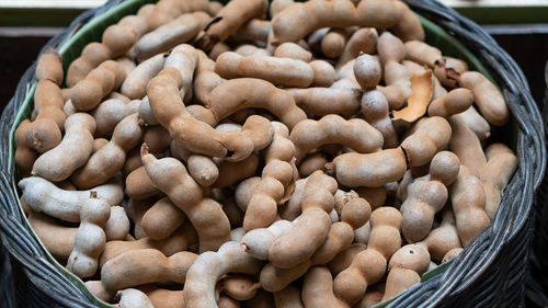 High angle view of beans in wicker basket