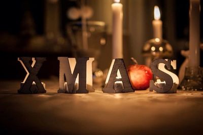 Close-up of candles on table