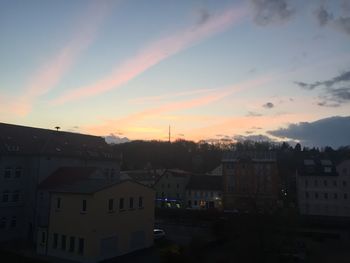 Houses in town at sunset