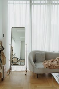 Mirror by sofa home