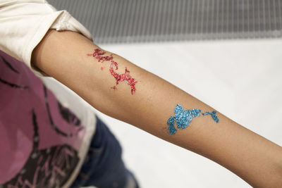 Close-up of woman hand with tattoo