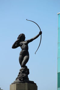 Low angle view of statue against clear sky