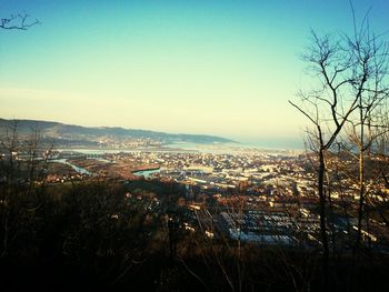 Cityscape with mountain range in background