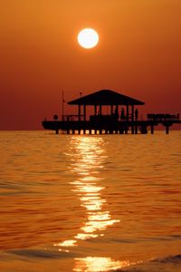 Scenic view of sea at sunset