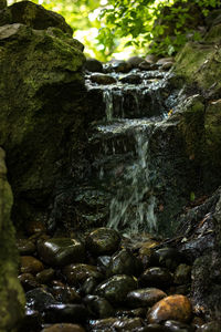 Close-up of water flowing through rocks