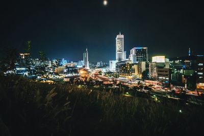 Illuminated city at night