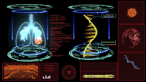 Close-up of illuminated lighting equipment against black background