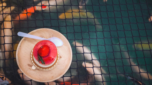 High angle view of strawberry on table