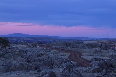 Scenic view of landscape against sky during sunset
