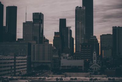 Modern buildings in city against sky