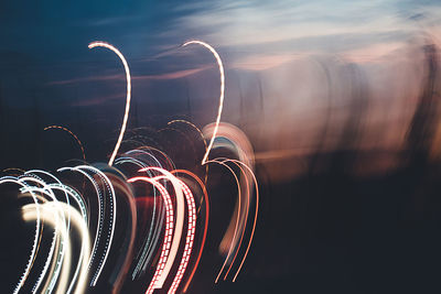 Light painting against sky at night