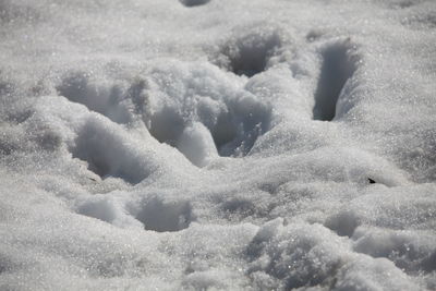 Full frame shot of snow covered land