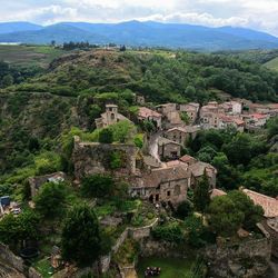 High angle view of townscape against mountain