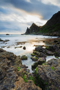 Scenic view of sea against sky during sunset