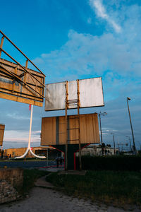 Low angle view of old building against blue sky