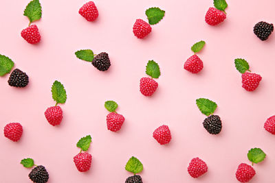 Close-up of fruits over white background