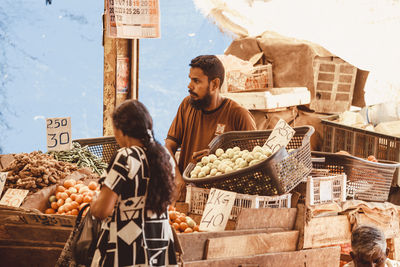 Friends for sale at market stall