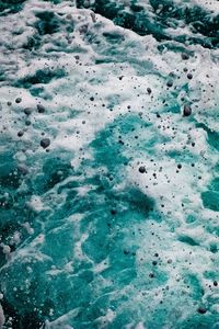 Stones falling in surf water