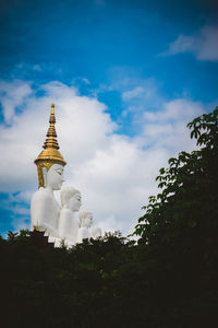 Low angle view of statue against sky