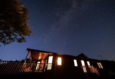 Low angle view of building against sky at night