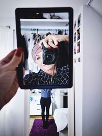 Close-up of man photographing