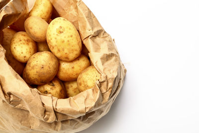 High angle view of bread on white background