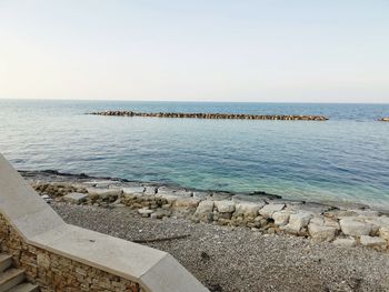 Scenic view of sea against clear sky