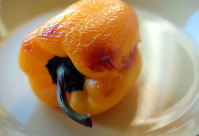 High angle view of orange slice in plate on table