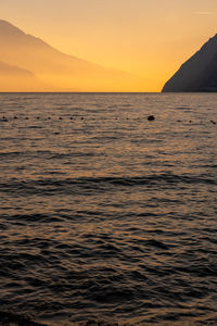 Scenic view of sea against sky during sunset