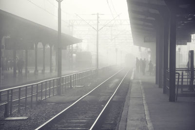 Railway station platform against sky