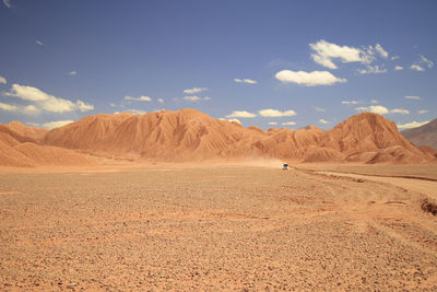 Scenic view of desert against sky