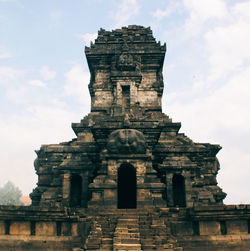 Low angle view of old building against sky