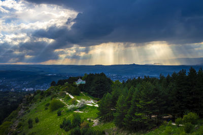 Scenic view of sea against cloudy sky