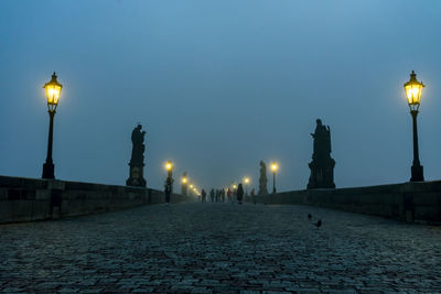 Illuminated street light at night