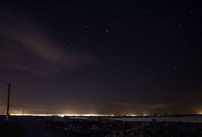 Scenic view of star field against sky at night