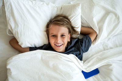 Young woman sleeping on bed at home