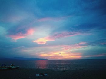 Scenic view of calm sea at sunset