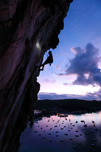 Scenic view of rock formation against sky during sunset