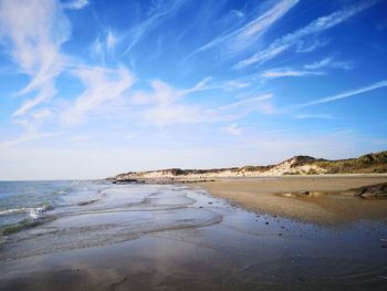 Scenic view of beach against sky