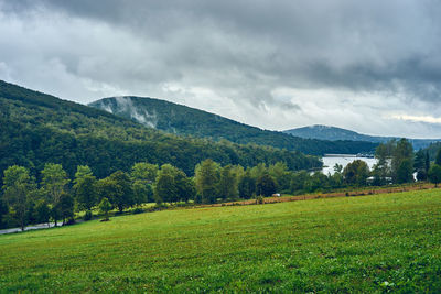 Scenic view of field against sky