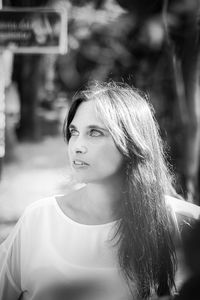 Close-up of young woman looking away