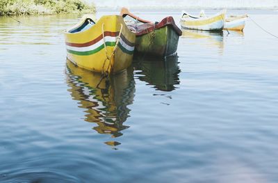 Boats in calm lake