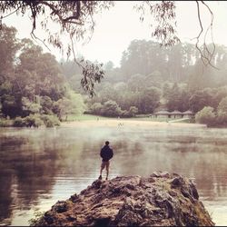 Man standing in lake